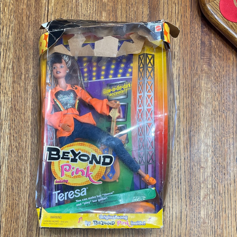 Barbie Beyond Pink Teresa Doll with Orange and Blue Outfit